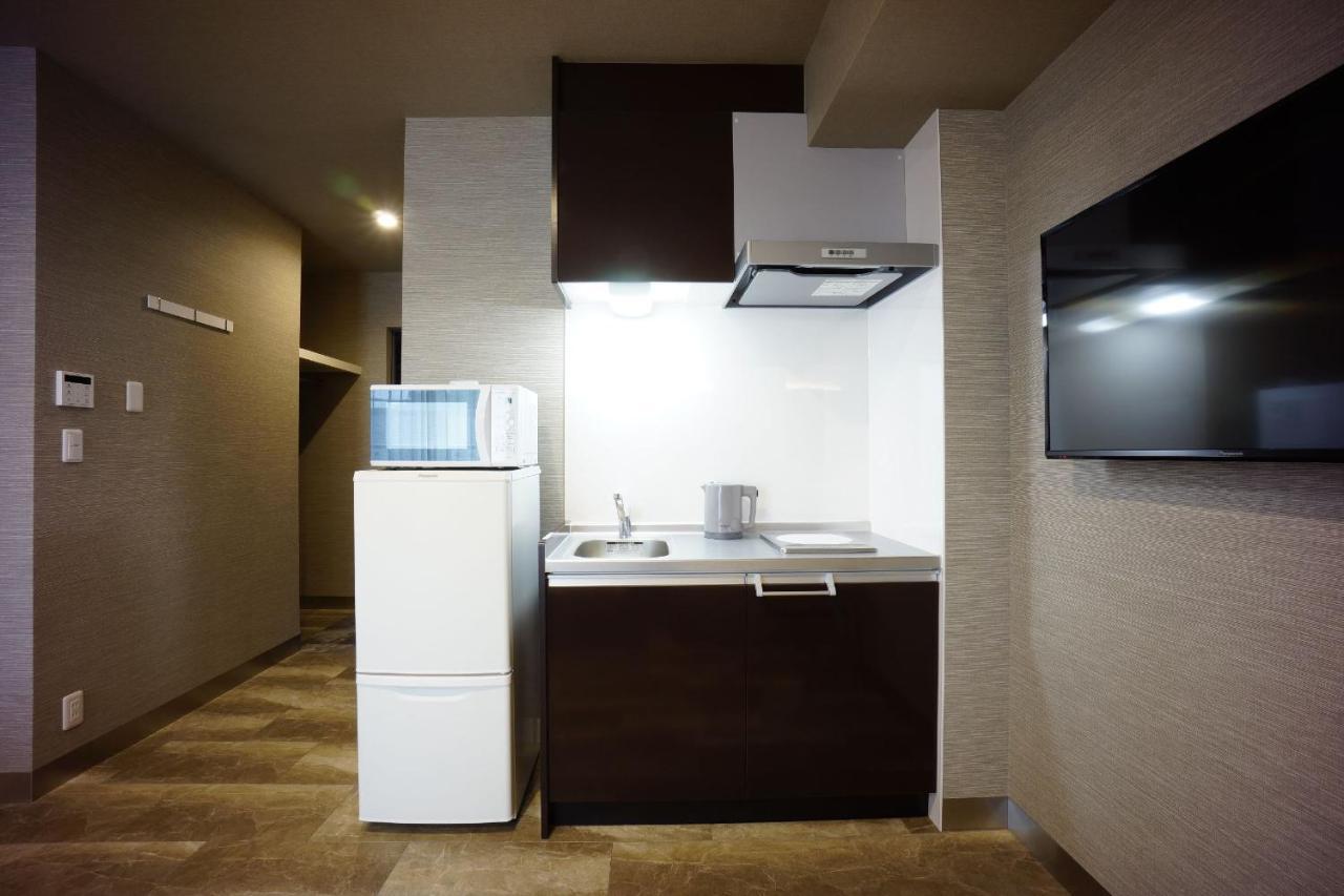 The South Hotel Tokyo Komae Rom bilde